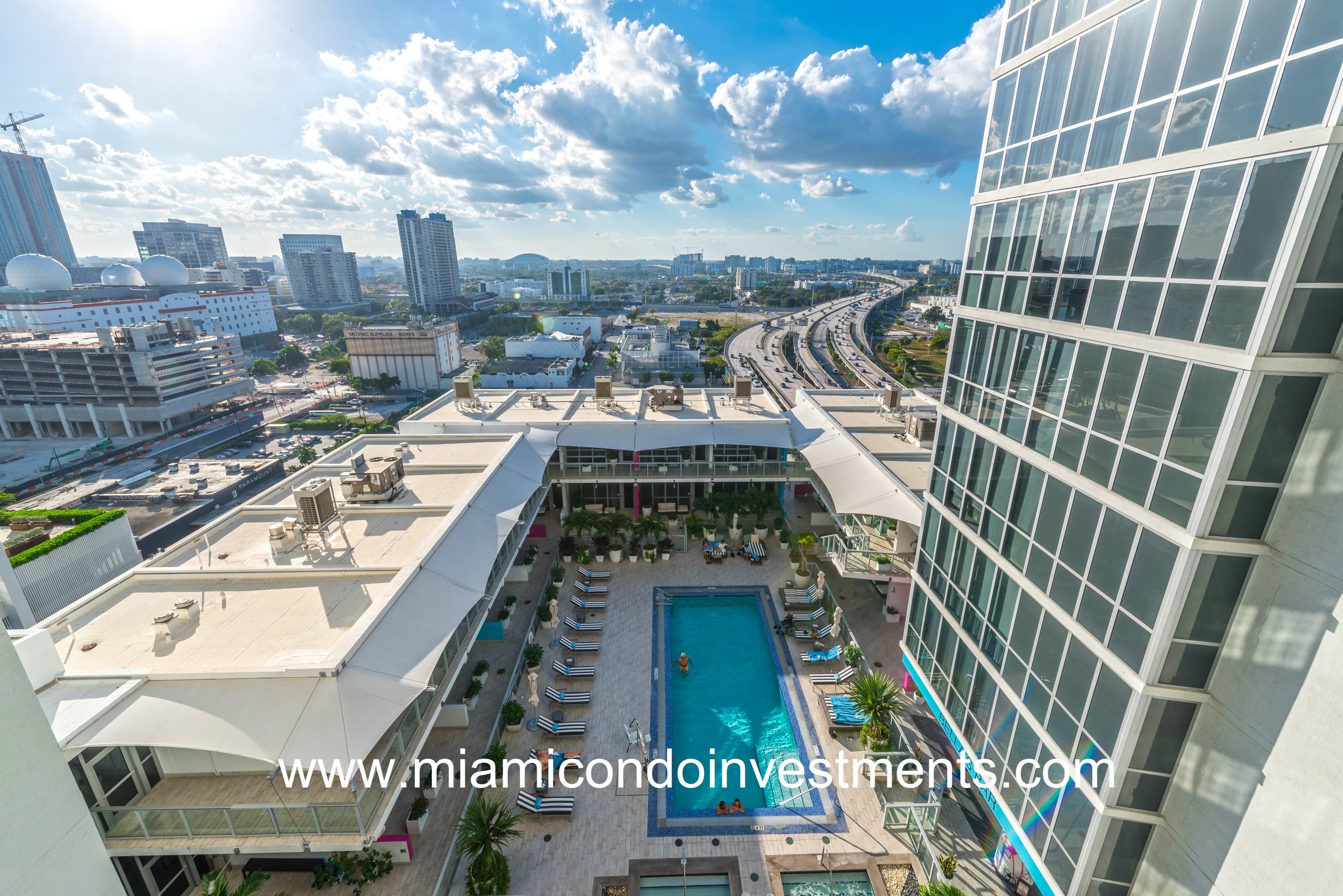 The Marquis Residences of Miami features a lagoon style sunset pool with poolside juice and salad bar.