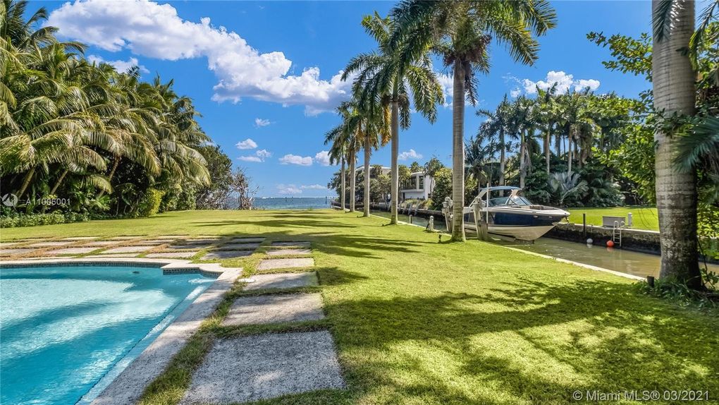 Dock and Yard Views of Coconut Grove Mansions