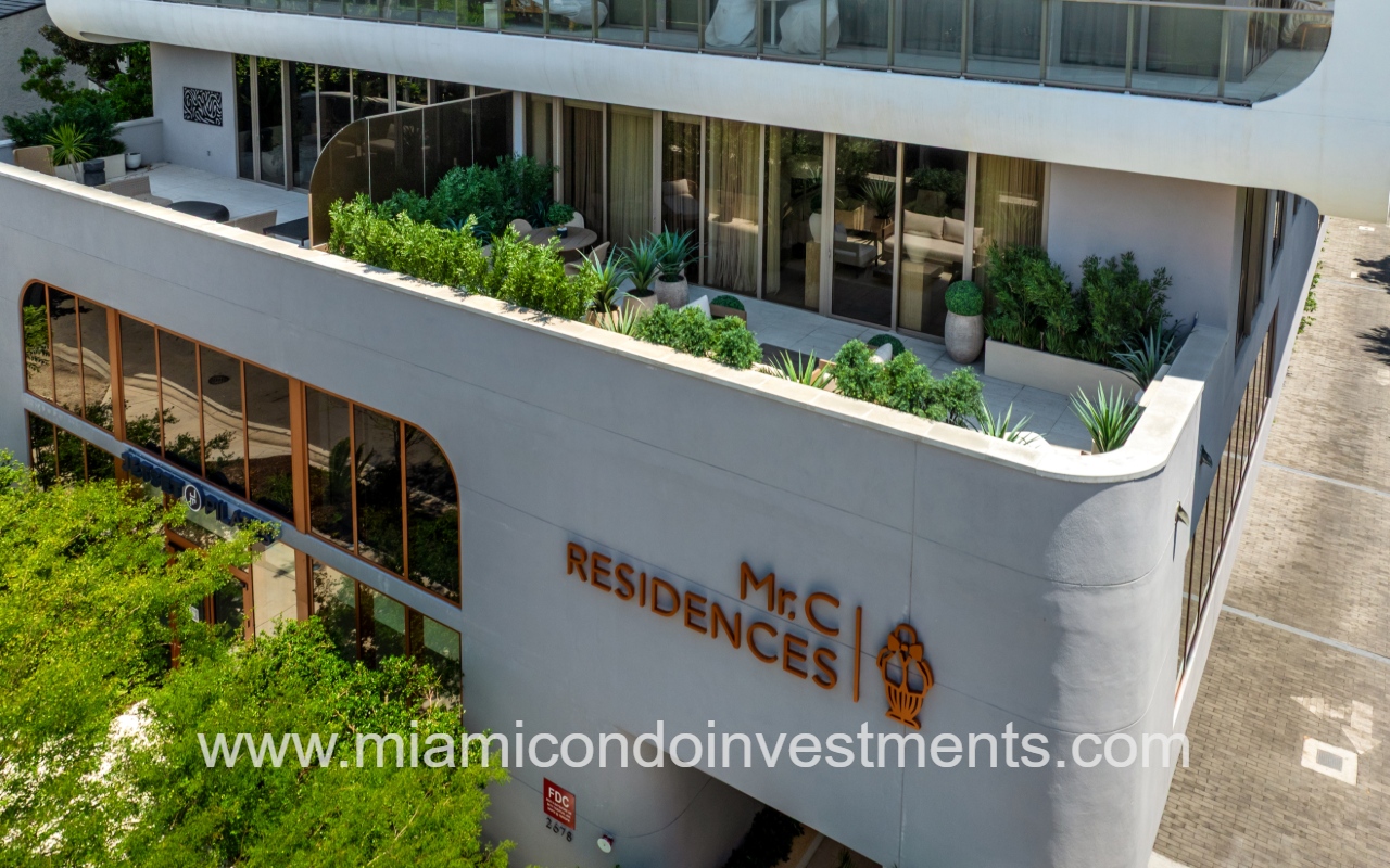 Mr. C Tigertail Residences closeup of lower building with logo