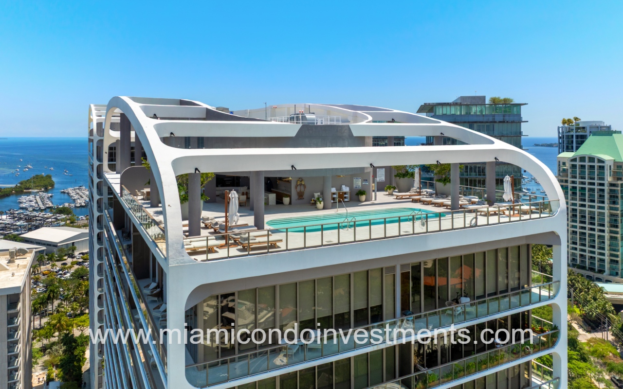 Mr. C Tigertail Residences drone closeup facing top of building and pool