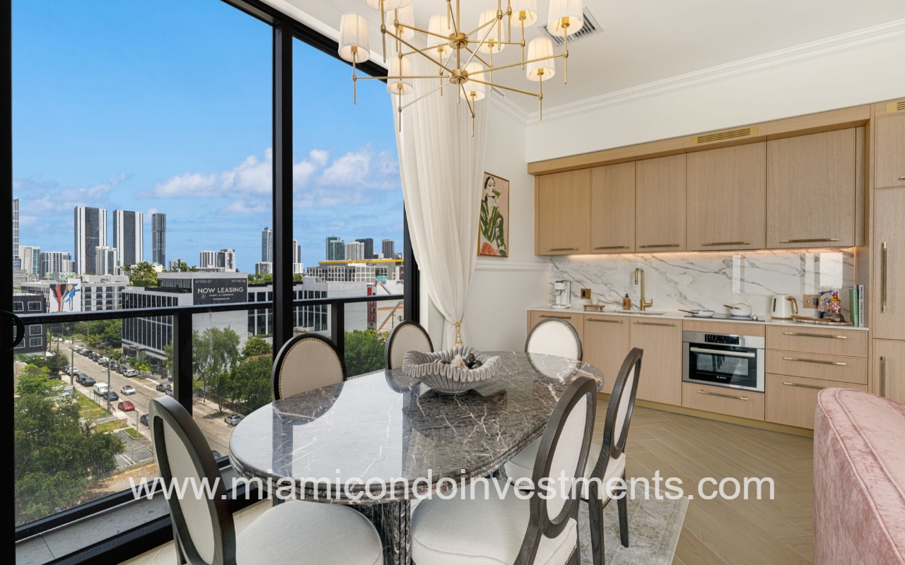 NoMad Wynwood dining area with view outside sliding glass door