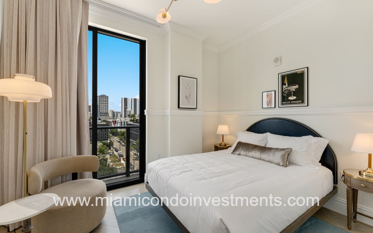 NoMad Wynwood 2-bedroom inside bedroom facing bed and glass sliding doors