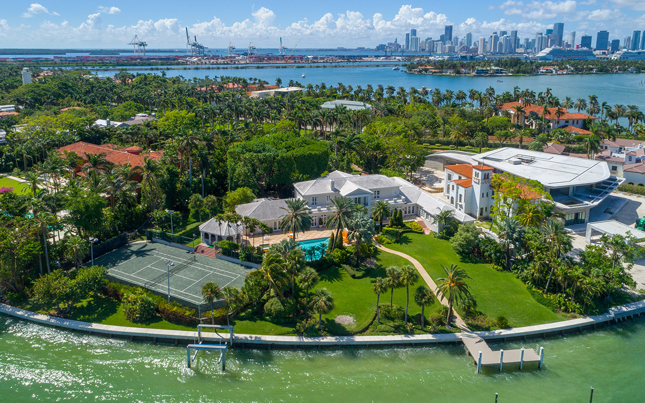 Miami waterfront home with Miami skyline in background
