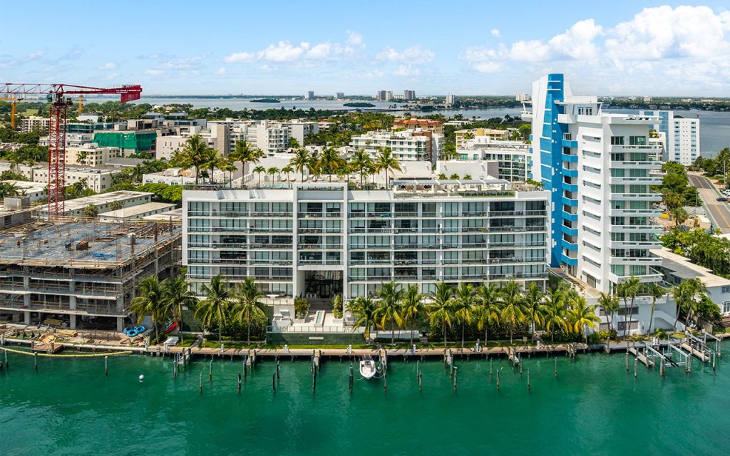 Sereno Residences in Bay Harbor Islands drone of building and private boat slips