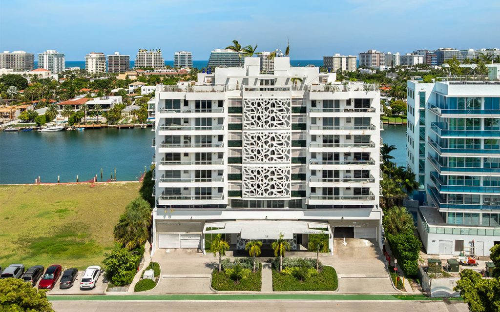 The Ivory condo in Bay Harbor Islands drone shot of building and waterway