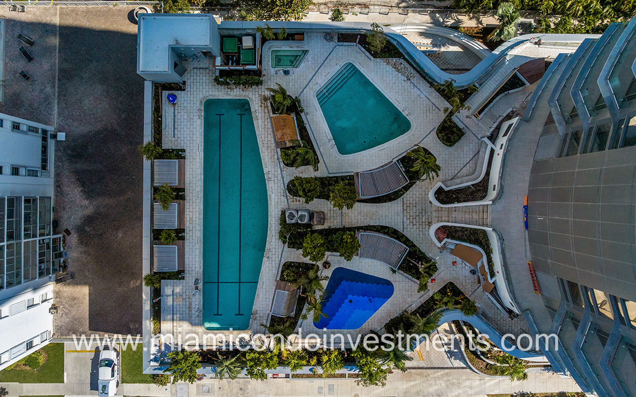 aerial view of the lap pool Jacuzzi and family pool at Una Residences