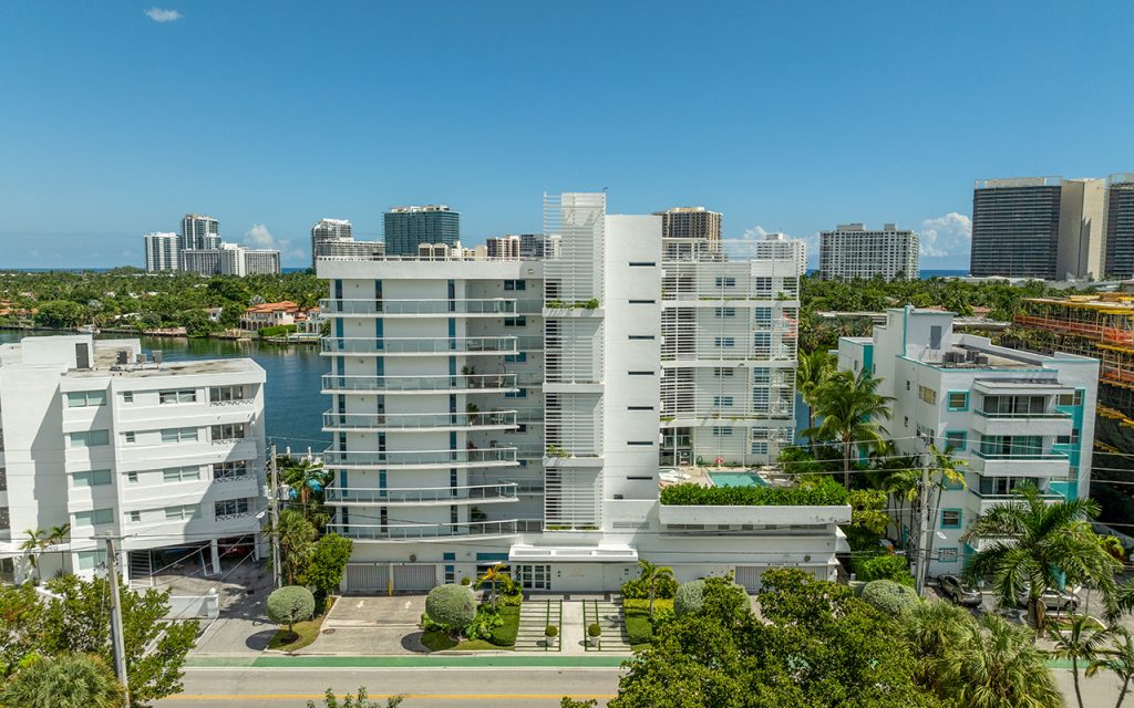 O Residences facing infinity pool on waterway and condo building