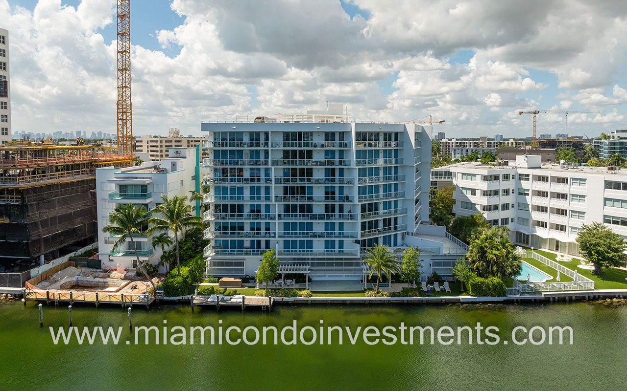 O Residences drone facing back of building and waterway closeup