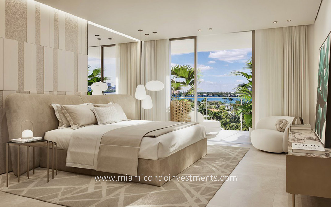 Origin Residences primary bedroom with balcony view