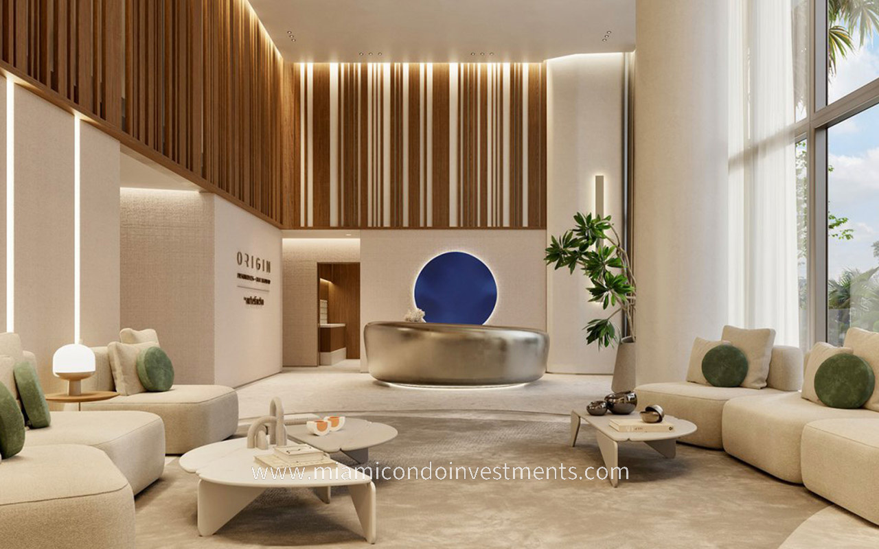 Origin Residences lobby seating and reception area