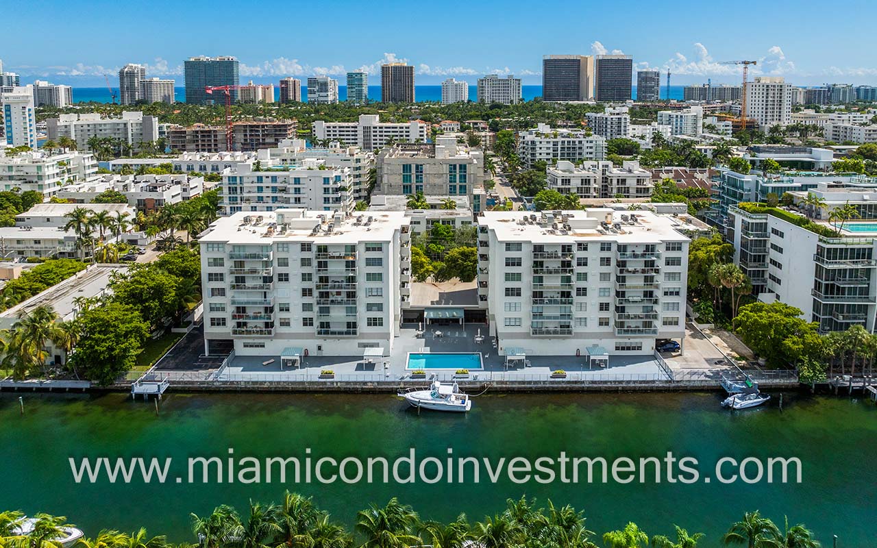 Ten Thousand Plaza drone from back of building and waterway with city view