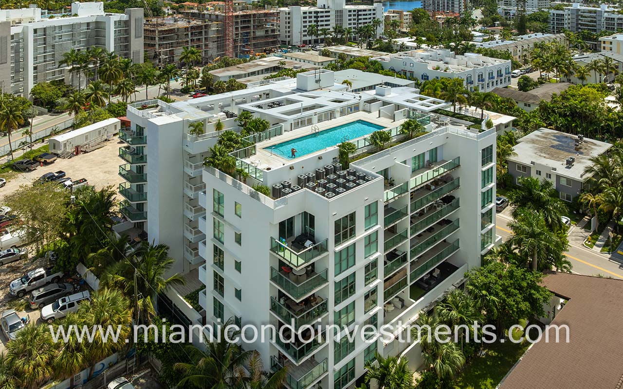 The Palms condos drone of building and pool