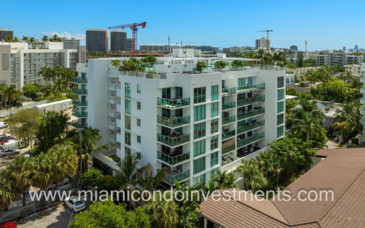 The Palms condos drone of building side angle