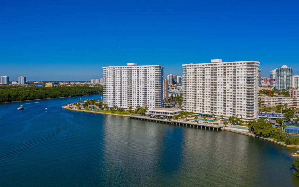 Arlen House Condo drone facing building on waterfront