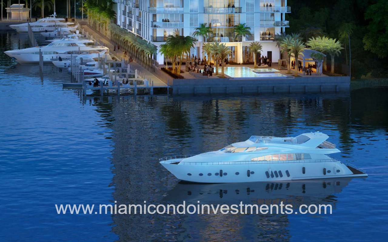 Marina Palms North condominium marina with yacht passing by