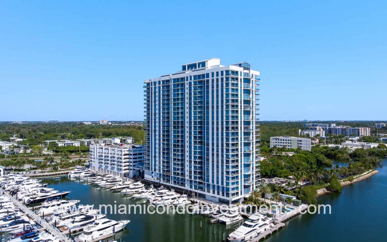 Marina Palms North drone facing condo building from above waterway