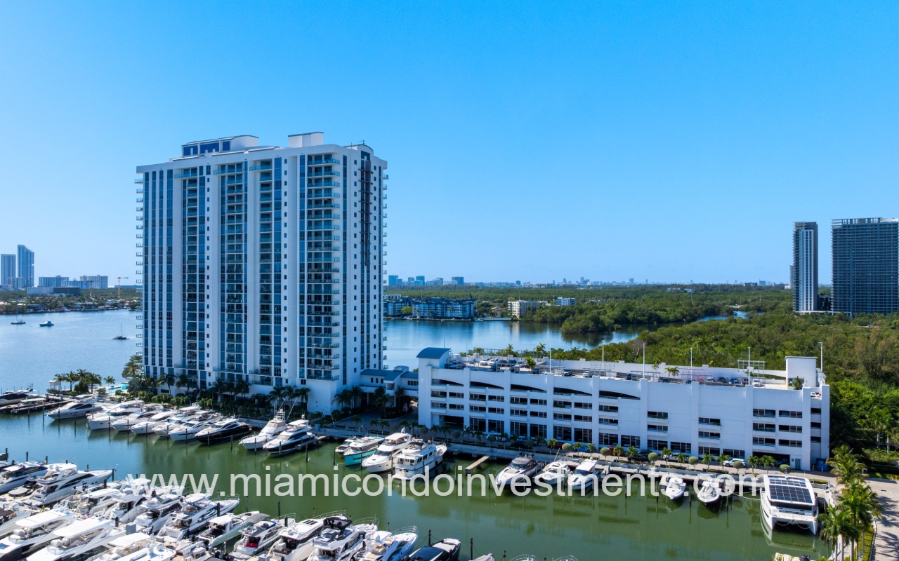 Marina Palms South drone view overlooking condo building and parking garage
