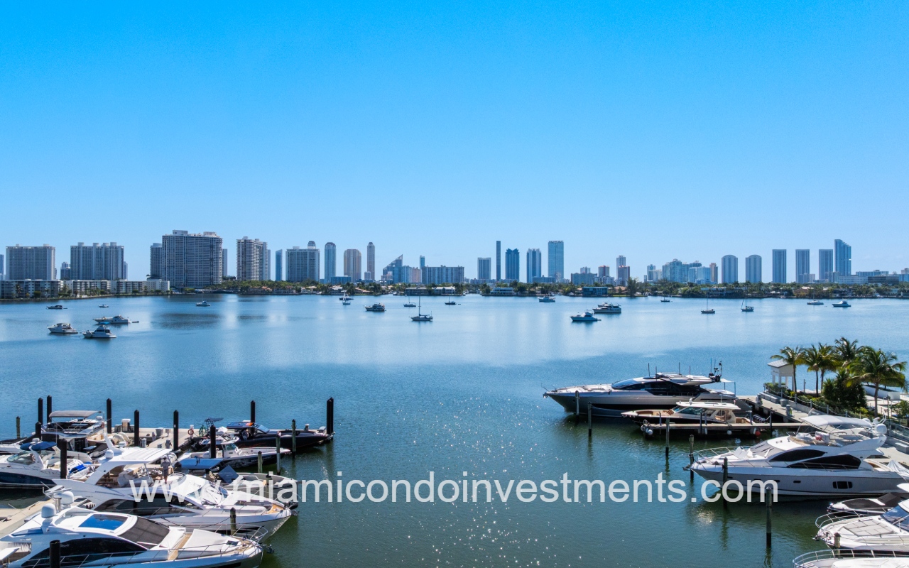 Marina Palms South drone view of lake with and buildings skyline from condo building marina